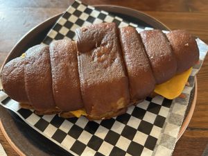 croissant mixto (bacon and cheese)  at Bite Me Cafe in Madrid
