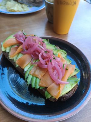 Tostada de aguacate con salmón at Bite Me Cafe in Madrid