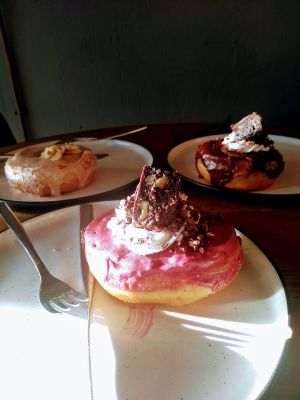 Chai Tea, Brownie and Raspberry Doughnuts, all delicious! at Bite Me Cafe in Madrid
