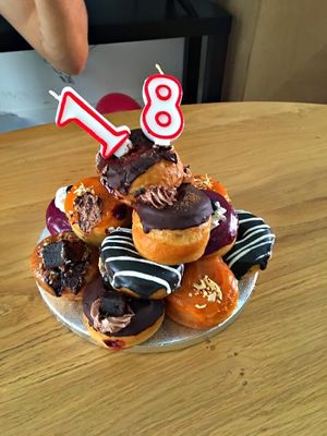 Happy birthday donut tower  at Bite Me Cafe in Madrid