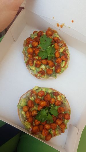 Spicy chickpea and guacamole bagel at Bite Me Cafe in Madrid