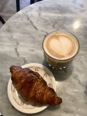 Vegan croissant and oat milk cappuccino  at De Laatste Kruimel - Langebrugsteeg in Amsterdam