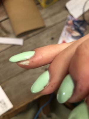 Messy edges and nail polish left on my skin   at Line Spa and Polish in Vancouver