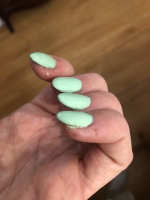 Messy edges and nail polish left on my skin  at Line Spa and Polish in Vancouver