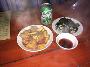 tofu with tomato, fried mushroom tofu in betel leaf at Nha Hang Hoa Tam Chay in Sapa