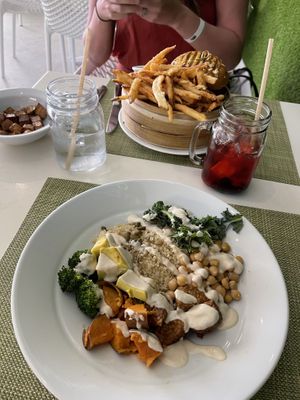Buddha bowl (in front) and the lentil burger (in back)  at Garden Fresh Cafe in Palm Beach