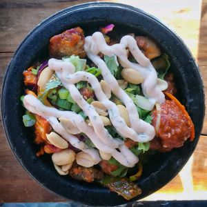 KFC (Korean Fried ‘Chicken’) stone bowl. So tasty/spicy good! at The Street Eatery in Calgary