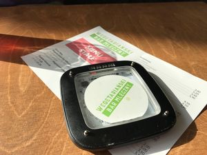 Menu and meal timer (freshly made pierogi mean grabbing a timer and waiting a short while for fresh, hot, delicious food!) at Wegetarianski Bar Mleczny in Warsaw