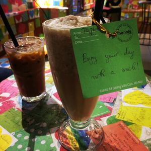 Delicious coconut coffee with soy milk and a cute note! at The Note Coffee in Hoi An