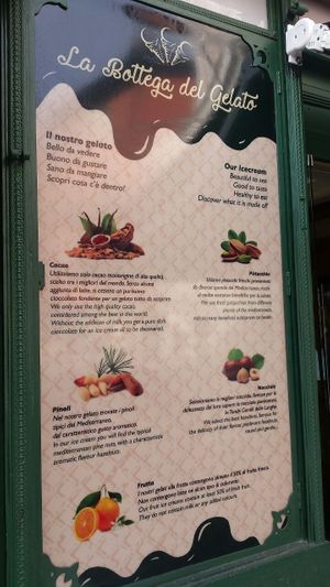 The sine outside showing where their products are coming from. at La Bottega del Gelato in Pisa