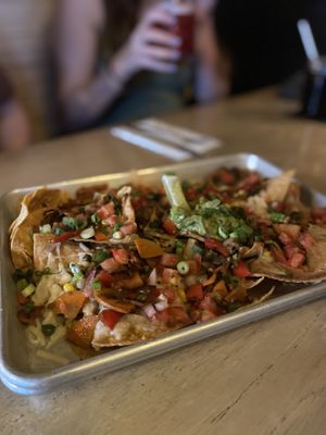 Sharing nachos   at Diego's in Newport