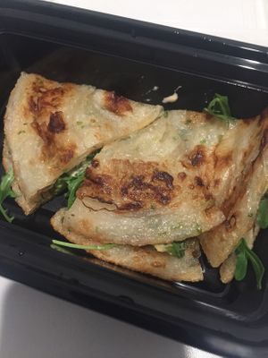 Scallion Pancake with avocado, greens, and spicy mayo at LuAnne's Wild Ginger - Franklin in Brooklyn