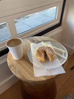 Vegan sweet potato glazed donut with almond milk latte. Not a bad way to start the day! at Johnny Doughnuts in San Rafael