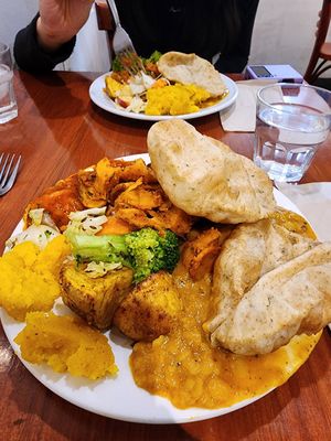 Whoops I overfilled my plate a bit. at Higher Taste Restaurant in Wellington