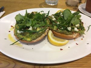 Avocado bagel with chilli flakes and vegan feta at Roots in Edinburgh