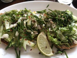 Avocado & vegan feta bagel at Roots in Edinburgh