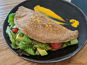 rice pancake stuffed with salad and avocado at Cafe Parallel 43 in Sofia