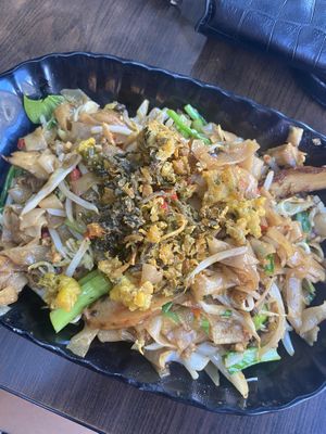 This is listed on the menu as “fried kwei dioa” so good  at Yi Xin Vegetarian 一心素食 in Central Singapore