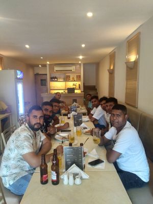 Indian Navey customers enjoy meal at Yashoda indian Restaurant.  at Yashoda Indian Restaurant in Nha Trang
