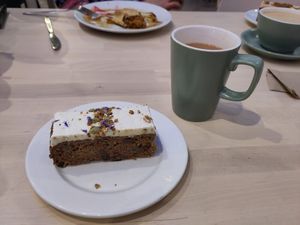 Carrot cake with a tea with soy milk at Eden Project in St Austell