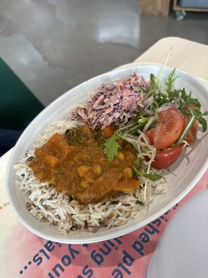 Squash curry with grains and seeds, vegan coleslaw and salad   at Eden Project in St Austell