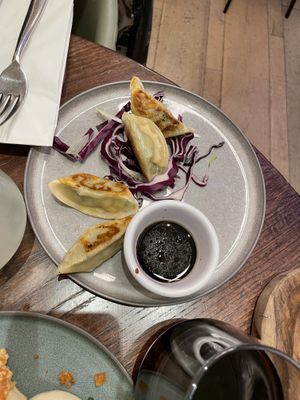 Spicy gyoza  at Wulf & Lamb Chelsea in London