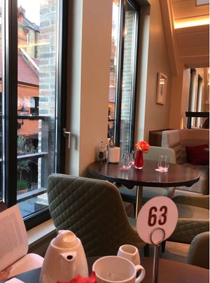 Interior upstairs - you order at the counter first and then take a table number at Wulf & Lamb Chelsea in London