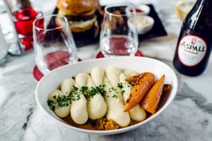 Wulf Pie: pulled jackfruit and lentil stew with mashed-potato and roasted baby carrots at Wulf & Lamb Chelsea in London