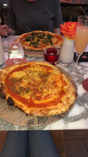 Vegan Margherita and broccoli/artichoke pizza at Wulf & Lamb Chelsea in London