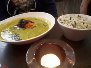 Green curry with rice at Wulf & Lamb Chelsea in London