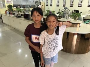 Cute kids who volunteered and served/greeted us at Rain Flower Home in Jinjiang