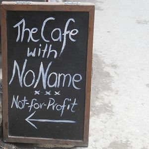 chalk board outside at The Cafe With No Name in Kathmandu