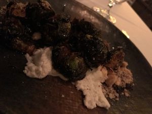 Brussel sprouts, bourbon glaze, cashew cream, toasted macadamia  at California Market at Pacific's Edge in Carmel-by-the-sea