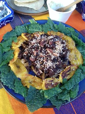 Mole con portobello, platano macho y kale at Ol-Lin Vegan in Ajijic