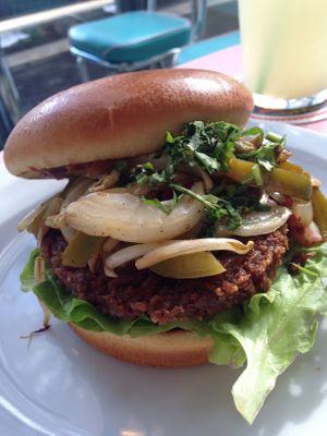 Burger is served with a slanted top-bun. Nice presentation! at HD Diner - Bastille in Paris