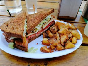 vegan BLT with home fries at The Hogtown Vegan in Toronto