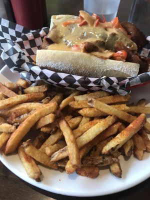 Philly cheesesteak with fries  at The Hogtown Vegan in Toronto