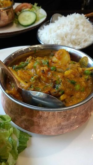 Vegetables with Garam Masala at the front and Aloo Gobi, both with rice at India Palace in Trollhattan