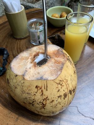 Coconut and a fresh orange juice  #Veganuary at Choux Choux Cafe in Playa Del Carmen