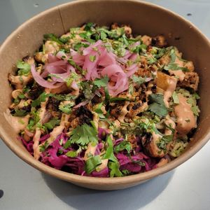 Cauliflower Bowl (cauliflower, rice, cabbage, lettuce, tomato, black beans, corn, onion, cilantro, vegan chipotle crema) - 5/5 at Taps & Tacos in Port Moody