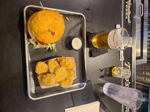 Vegan chicken sandwhich with fried pickles. Medium spice at Flippin' Good in Las Vegas