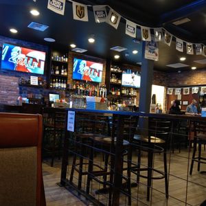 Sports bar dining area. Booth or high table. at Flippin' Good in Las Vegas