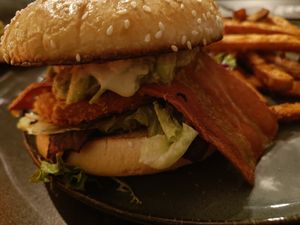 Burger with lots of add-ons at Backstage Vegan Kitchen in Rotterdam