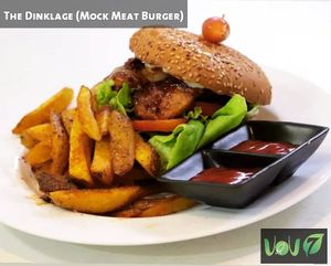Inhouse made Seitan(wheat gluten mock meat) marinated in VoV special BBQ sauce, served with caramelized  onions, tomatoes and lettuce . at The VOV in Negombo