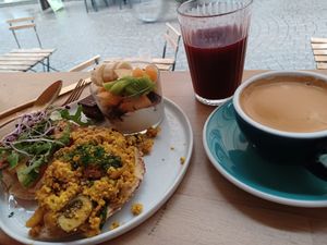 Menu XL , small toast with hummus + small toast scrambled "egg"+ small parfait + small chocolate caramel slice + juice and coffee at Life Bar in Leuven