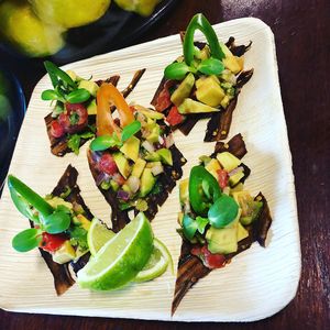 Guac Nachos On Eggplant Bacon Chips....mmmm at Vegan Farmacy in Fort Pierce