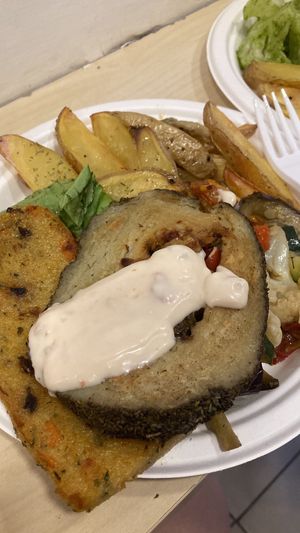 farinata(sotto) seitan(sopra) con mayo ai pomodori secchi.  at Officina Vegana in Naples