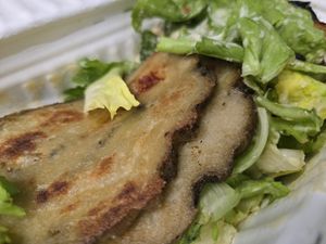 Seitan e insalata di scarola at Officina Vegana in Naples