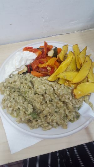 Rice, potato wedges, mixed vegetables, mayo at Officina Vegana in Naples