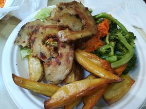 Seitan cuttlets with potatoes and veggies at Officina Vegana in Naples